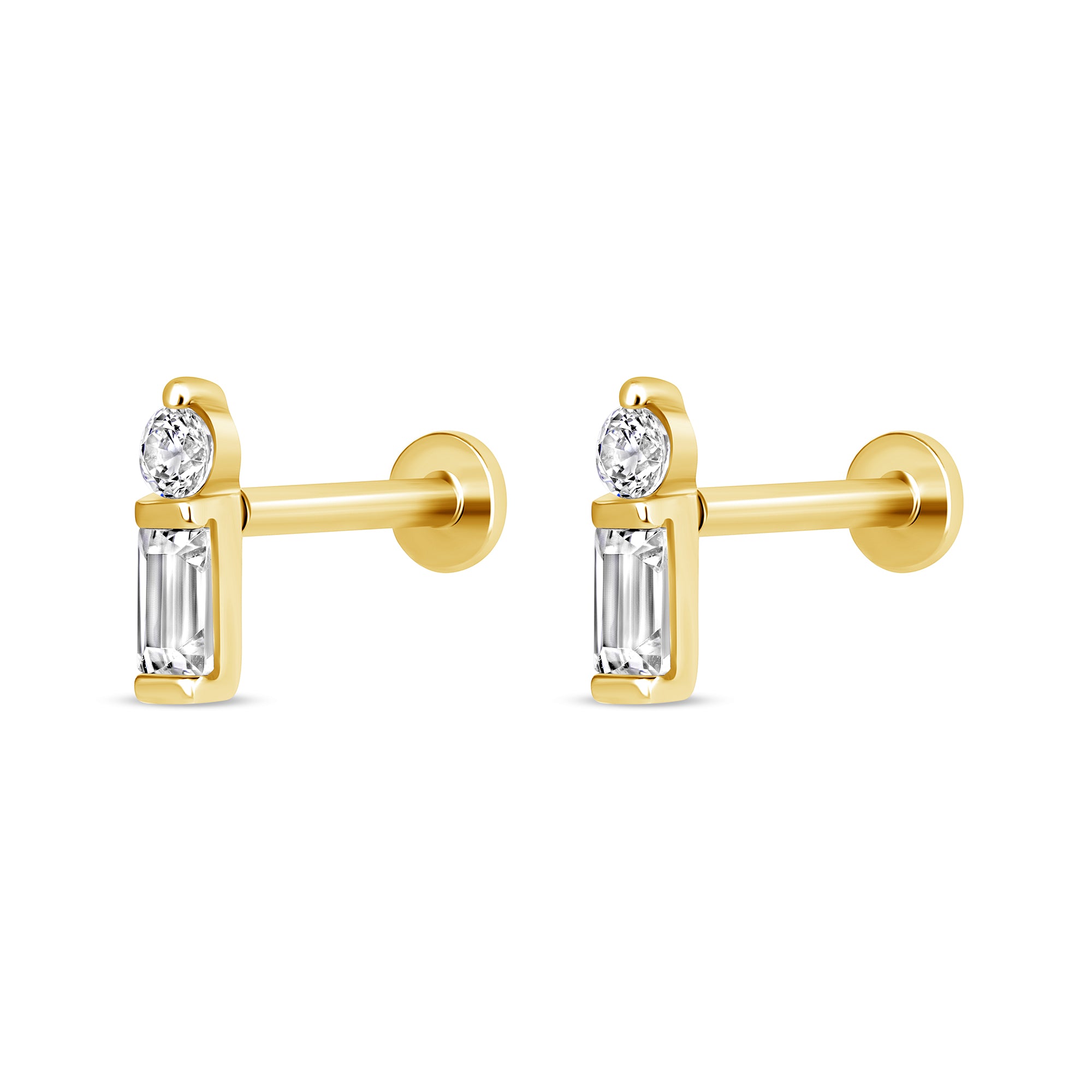 Gold earrings with clear gemstones on a white background